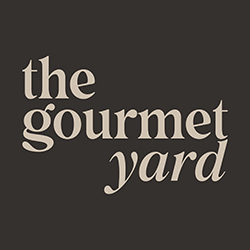 The Gourmet Yard — Embassy Suites by Hilton Dubai Business Bay logo